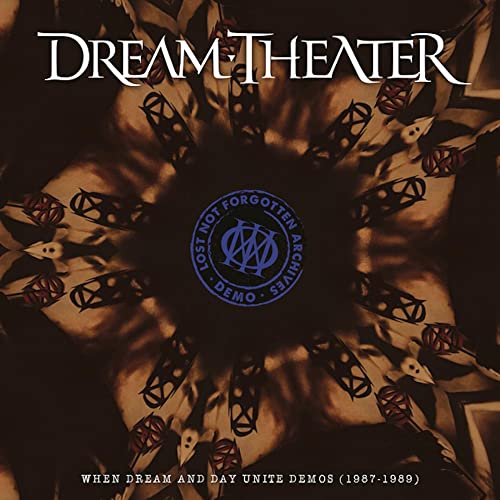 Dream Theater album cover: dark floral pattern with central blue emblem.