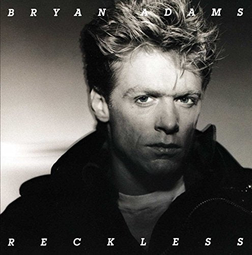 Black and white album cover featuring a portrait of Bryan Adams.