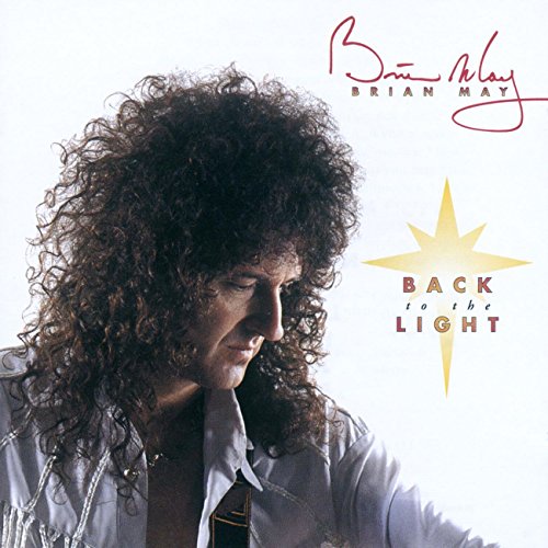 Brian May with curly hair on the cover of his album Back to the Light.