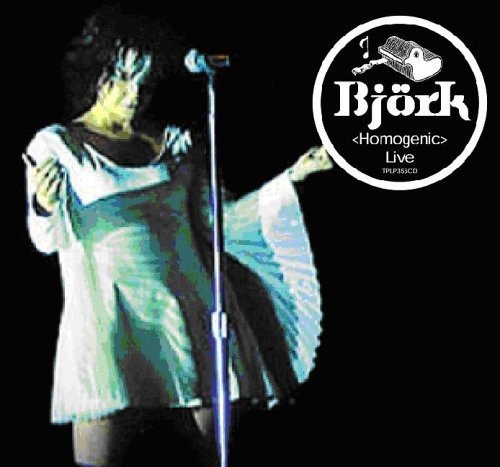 Woman in white dress singing into microphone on black background with logo.