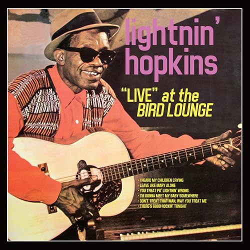 Lightnin’ Hopkins album cover: man with guitar, hat, and sunglasses.