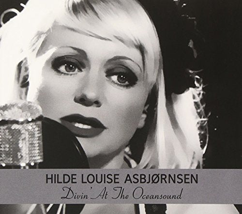 Black and white portrait of a woman with blonde hair and dark lipstick.