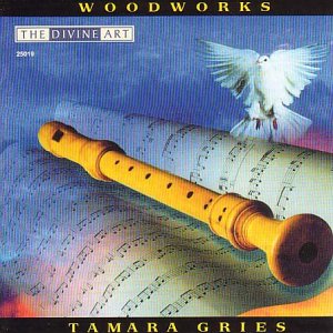 CD cover with recorder, sheet music, and a white dove in flight.