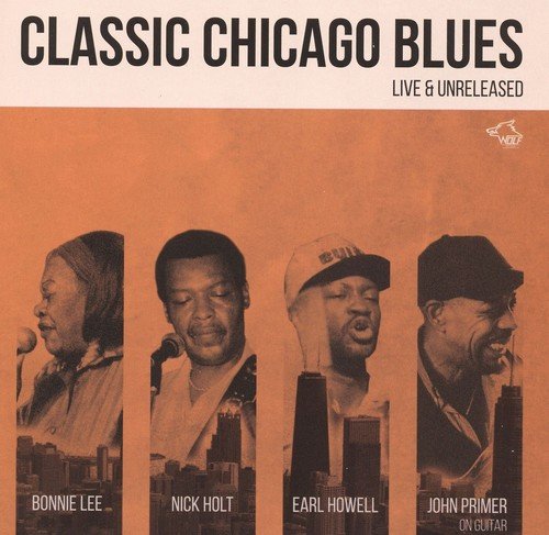 CD cover featuring four Black blues musicians and a city skyline.