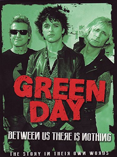 Green Day band members on DVD cover with bold red lettering.