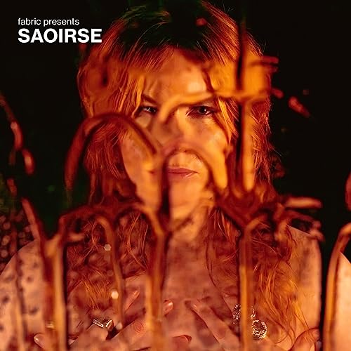 Album cover featuring Saoirse with long red hair, partially obscured by lines.