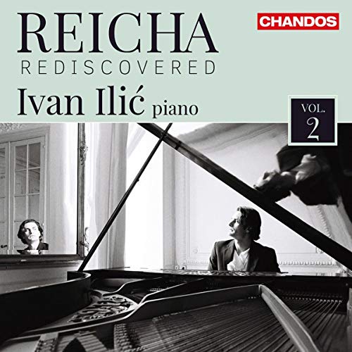 CD cover: Pianist Ivan Ilić performing, with a portrait in the background.