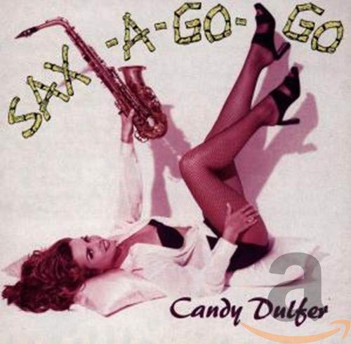 Candy Dulfer album cover featuring a woman with a saxophone.