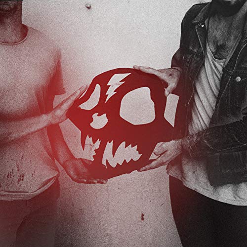 CD cover: person holding a red skull-shaped pillow, distressed effect.