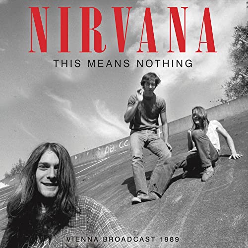 Nirvana album cover: black and white photo of band members relaxing.