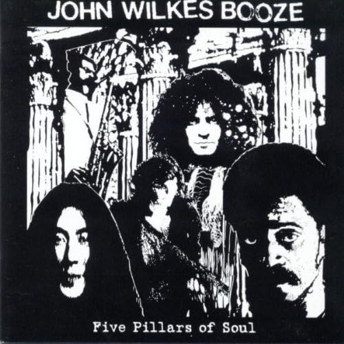 Black and white album cover featuring portraits of four musicians.