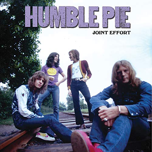 Humble Pie album cover: four men posing on railroad tracks.