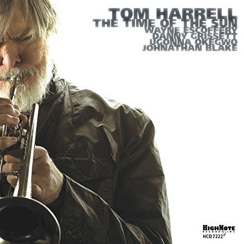 Tom Harrell playing trumpet on album cover, white background.