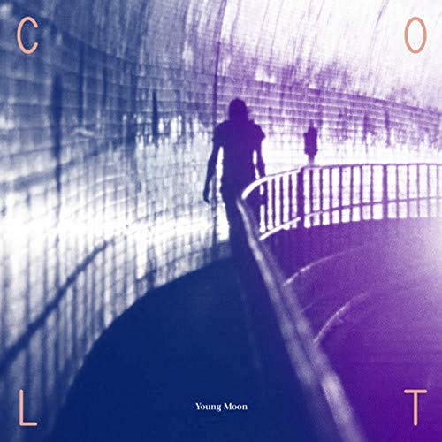 Vinyl record cover: a blurry blue image of a person in a tunnel.