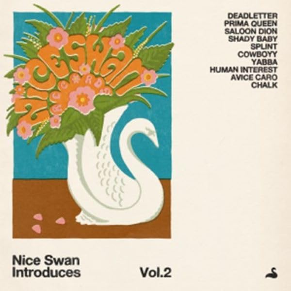 Vinyl album cover with a white swan, flowers, and text listing artists.