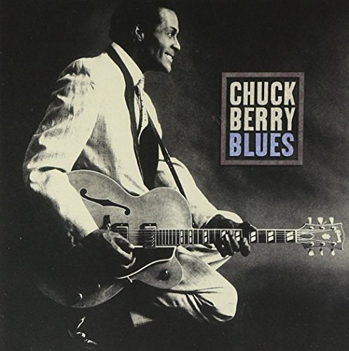 Chuck Berry playing a guitar on the album cover for "Blues".