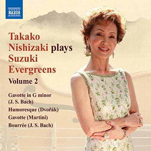 CD cover featuring pianist Takako Nishizaki and mountain backdrop.