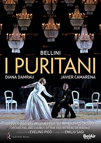 Opera singers Diana Damrau and Javier Camarena on stage under many hanging crystal chandeliers.