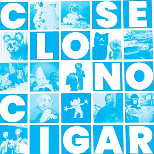 Blue album cover with a grid of vintage toy and portrait images.