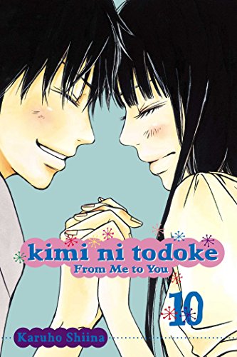 Manga cover showing a young man and woman smiling while holding hands.