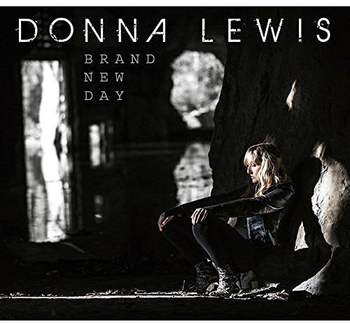 Donna Lewis "Brand New Day" CD cover, woman seated in a dark space.