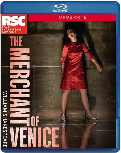 Blu-ray cover for Shakespeare’s *The Merchant of Venice* featuring a woman in red.