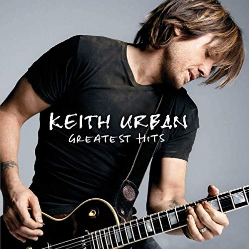 Keith Urban album cover featuring the artist with a guitar.