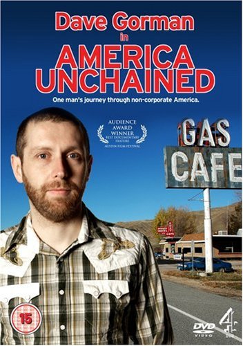 DVD cover for āDave Gorman in America Unchainedā featuring a man and gas station.
