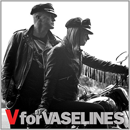 Black and white photo of a couple on a motorcycle, album cover.