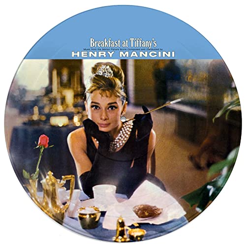 Breakfast at Tiffany's" vinyl record featuring Audrey Hepburn in a black dress.