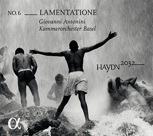 CD cover: black and white photo of people near a waterfall.