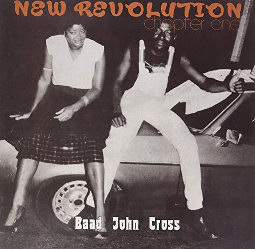 Vinyl album cover featuring two people leaning against a car.