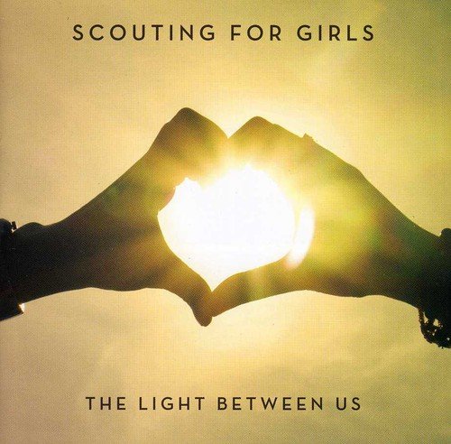 CD cover: hands forming a heart shape around a bright light.