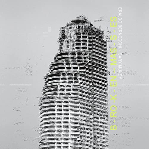 CD cover with a grayscale, fragmented image of a tall building.