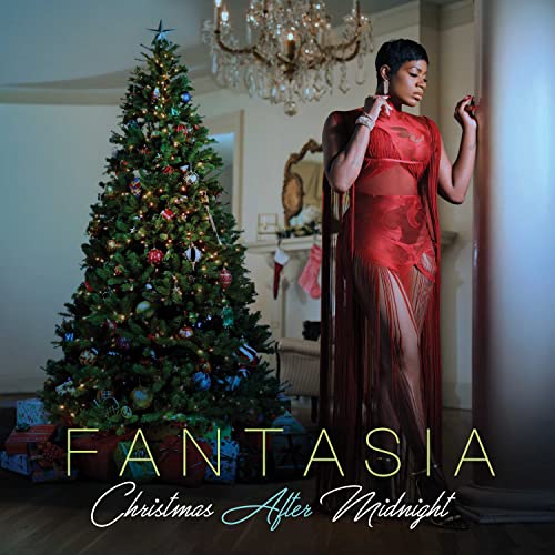 Fantasia album cover with a Christmas tree and artist in red dress.