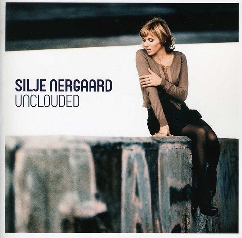 CD cover: Silje Nergaard portrait, seated and looking downward.