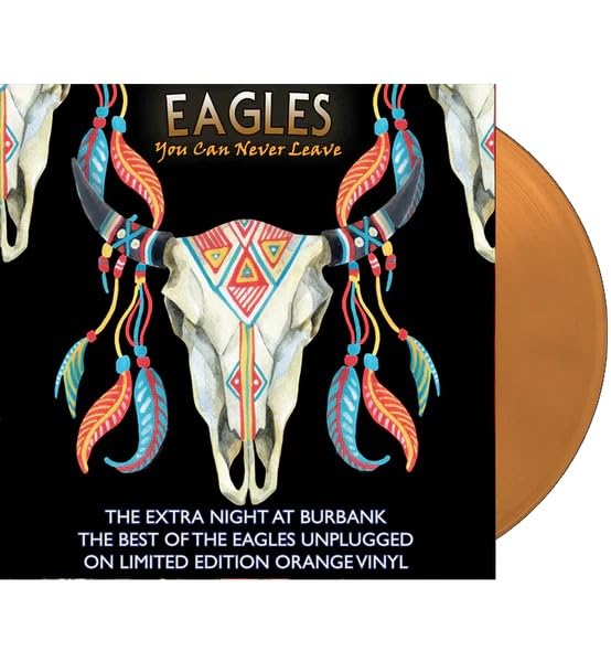 Eagles album cover featuring a decorated bull skull and orange vinyl record.