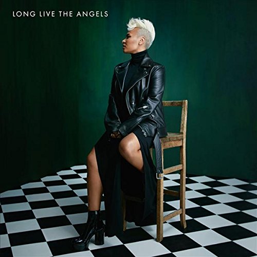 Emeli Sandé album cover, woman in black leather jacket seated.