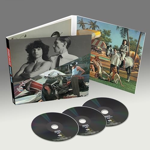 Open deluxe CD case for Sparks 75-76 with three discs arranged in front.