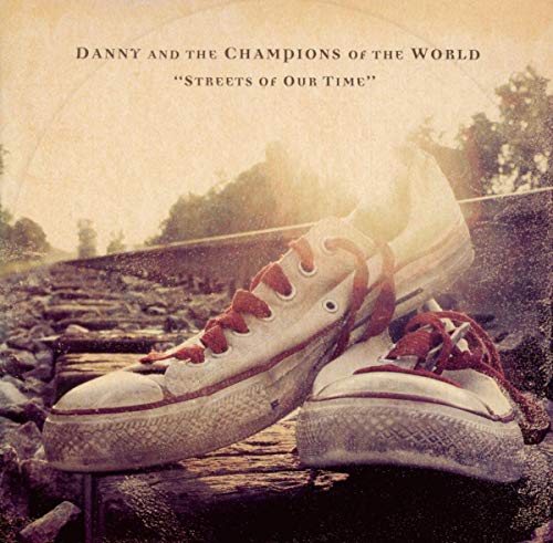 CD cover for “Streets of Our Time” featuring worn sneakers on tracks.