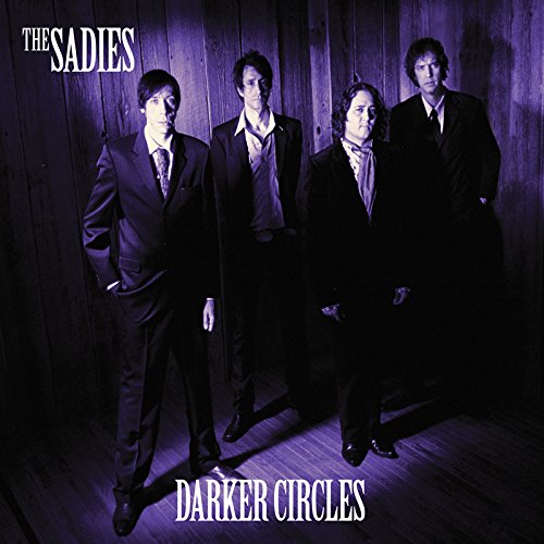 CD cover for The Sadies’ “Darker Circles” featuring four men in suits.