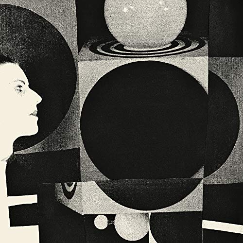 Black and white abstract album cover with a woman’s profile and spheres.