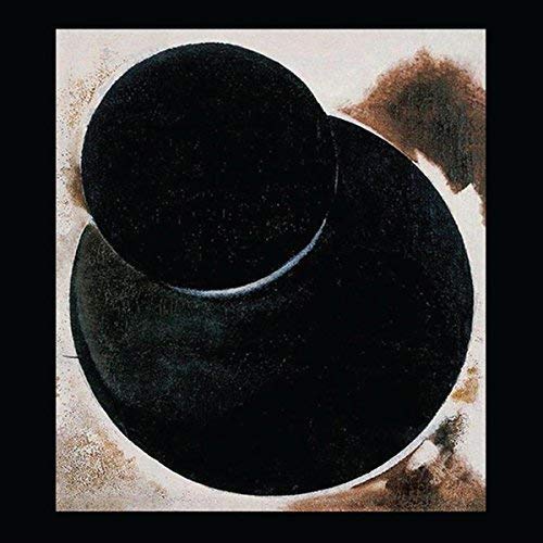 Abstract album cover with overlapping dark circles on a textured background.