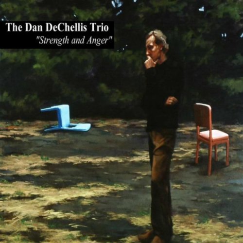 CD cover featuring a man standing between two chairs in a dark space.