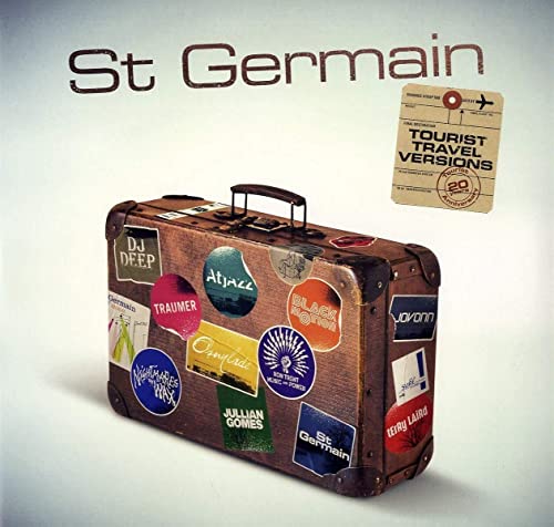 Brown vintage suitcase covered in travel stickers with St Germain text above it.