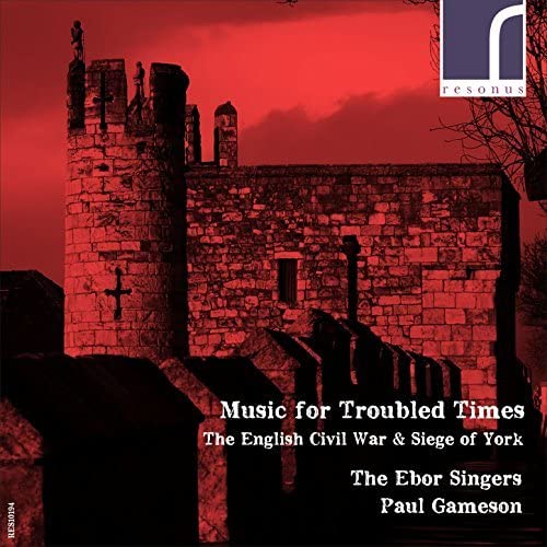 CD cover depicting a stone tower against a fiery red sky.