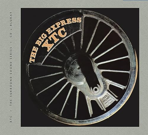 Album cover featuring a metal train wheel against a black background with text overlay.