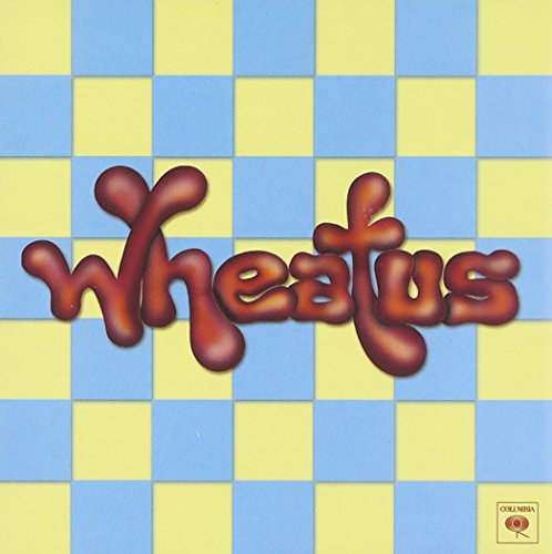 Wheatus" album cover with red, bubbly lettering on a yellow and blue checkerboard.