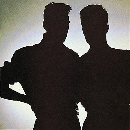 Silhouettes of two men against a pale, hazy background.
