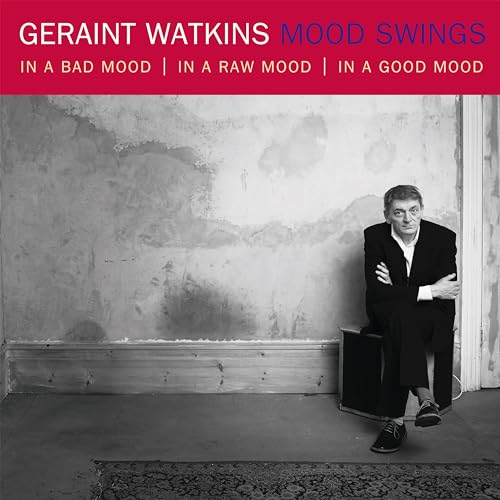 CD cover: Geraint Watkins in a suit leaning against a wall.